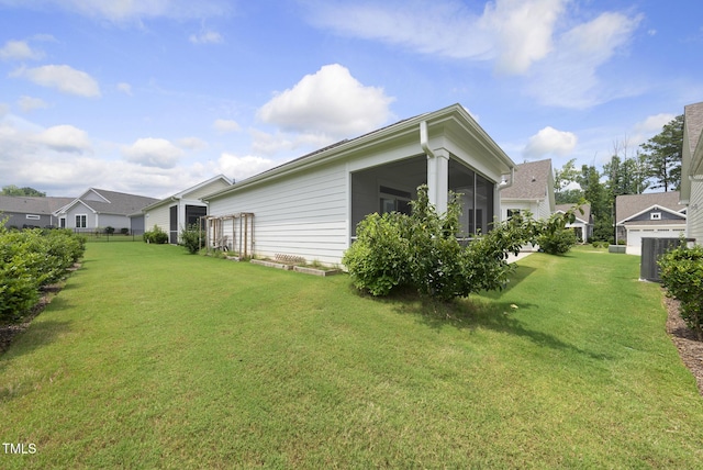 537 Bramble Ln, Clayton, NC 27527 - view of grassy yard featuring a sunroom