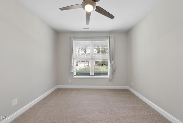 537 Bramble Ln, Clayton, NC 27527 - spare room with a ceiling fan and light carpet