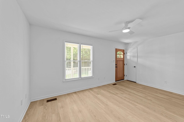 413 Top Greene Ln, Raleigh, NC 27601 - spare room featuring light wood finished floors, ceiling fan, and baseboards