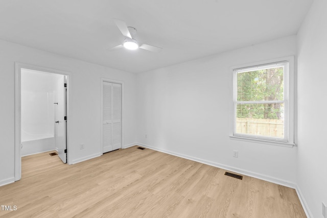 413 Top Greene Ln, Raleigh, NC 27601 - empty room featuring ceiling fan, light wood-style floors, and baseboards