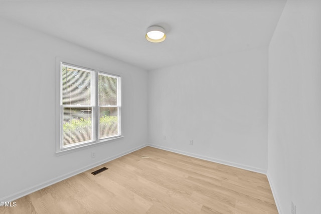413 Top Greene Ln, Raleigh, NC 27601 - spare room with light wood finished floors and baseboards