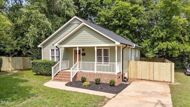 413 Top Greene Ln, Raleigh, NC 27601 - bungalow-style house featuring a porch