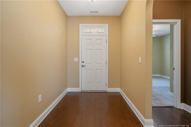 239 Nandina Ct Unit 21A, Fayetteville, NC 28311 - doorway to outside featuring dark wood finished floors and baseboards