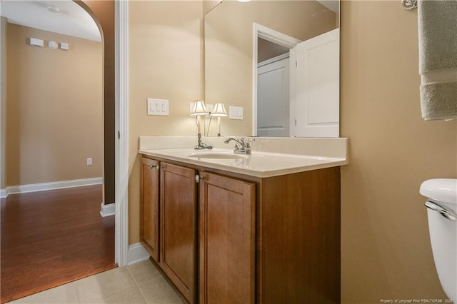 239 Nandina Ct Unit 21A, Fayetteville, NC 28311 - bathroom with vanity, toilet, baseboards, and tile patterned flooring