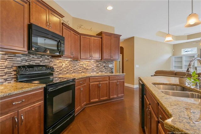 239 Nandina Ct Unit 21A, Fayetteville, NC 28311 - kitchen featuring black appliances, a sink, arched walkways, dark wood finished floors, and tasteful backsplash