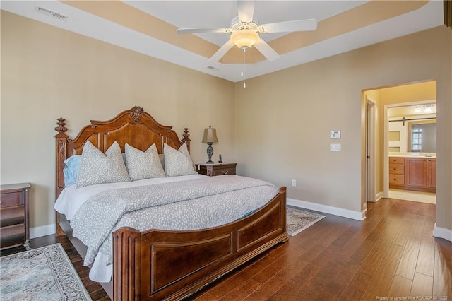 239 Nandina Ct Unit 21A, Fayetteville, NC 28311 - bedroom with baseboards, dark wood-style flooring, and a ceiling fan