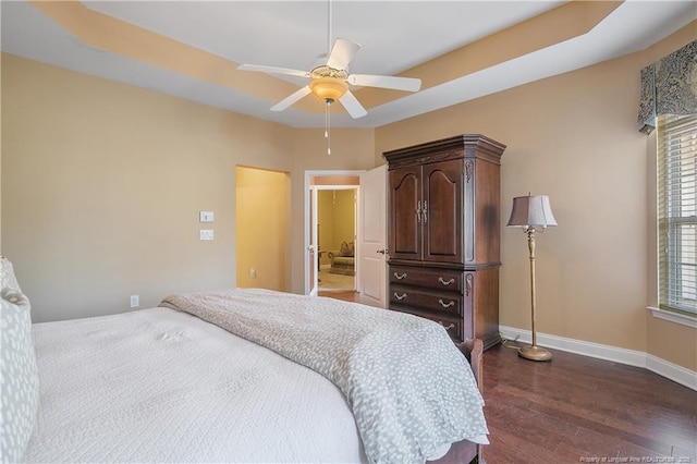 239 Nandina Ct Unit 21A, Fayetteville, NC 28311 - bedroom featuring dark wood-type flooring, baseboards, and a ceiling fan