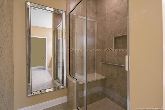 239 Nandina Ct Unit 21A, Fayetteville, NC 28311 - bathroom with a shower stall and baseboards