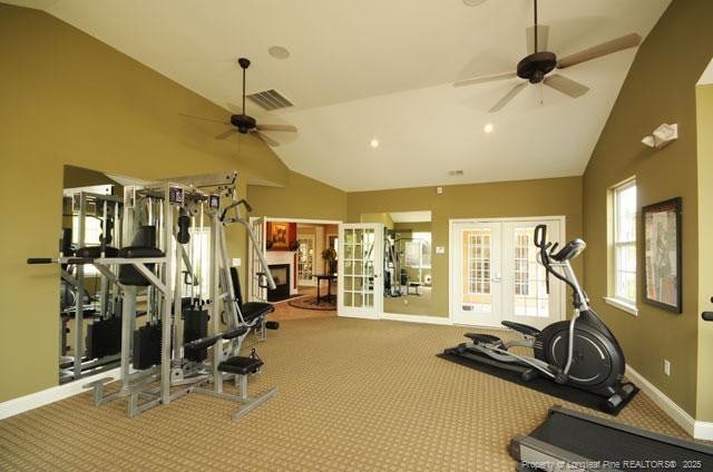 239 Nandina Ct Unit 21A, Fayetteville, NC 28311 - workout area featuring a ceiling fan, french doors, baseboards, carpet floors, and high vaulted ceiling