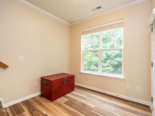 6206 Braidwood Ct, Raleigh, NC 27612 - unfurnished room with light wood-style flooring, ornamental molding, and baseboards