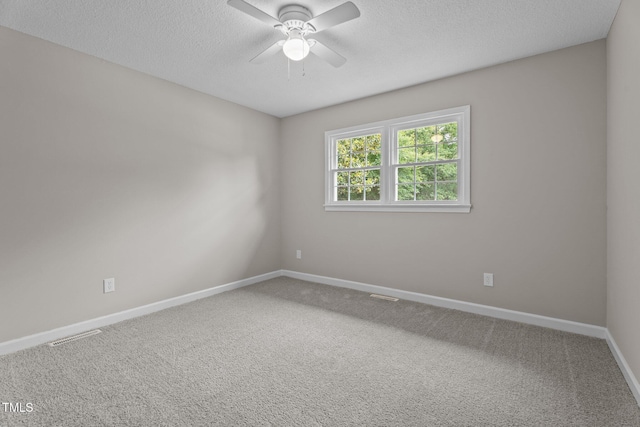 206 Bryant Cir, Goldsboro, NC 27534 - carpeted empty room featuring ceiling fan, baseboards, and a textured ceiling