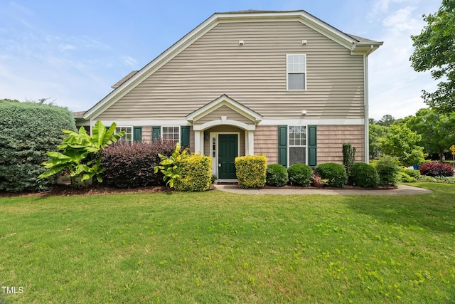 7873 Cape Charles Dr, Raleigh, NC 27617 - view of front facade with a front yard