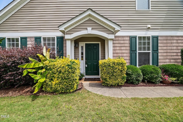 7873 Cape Charles Dr, Raleigh, NC 27617 - entrance to property featuring a yard