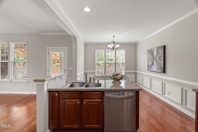 7873 Cape Charles Dr, Raleigh, NC 27617 - kitchen with dishwasher, a chandelier, dark wood-style flooring, a kitchen island with sink, and wainscoting