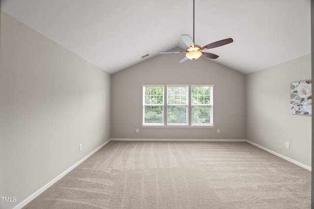 7873 Cape Charles Dr, Raleigh, NC 27617 - empty room with ceiling fan, vaulted ceiling, and carpet