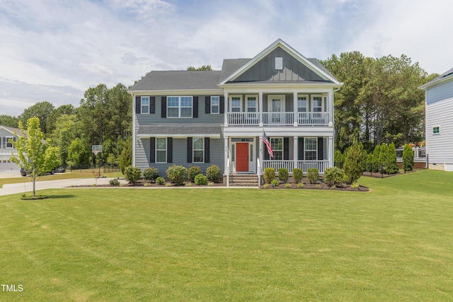 470 E Wellesley Dr, Clayton, NC 27520 - view of front of home with covered porch, board and batten siding, and a front yard