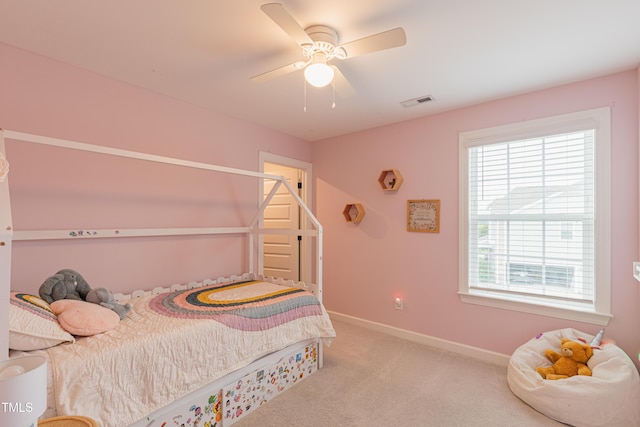 470 E Wellesley Dr, Clayton, NC 27520 - carpeted bedroom with multiple windows and a ceiling fan