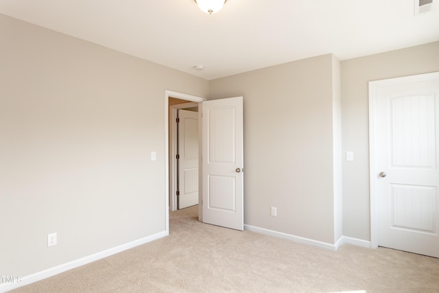 6700 Hardwick Ln, Sims, NC 27880 - unfurnished bedroom with light colored carpet and baseboards