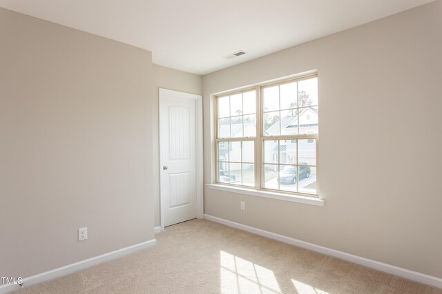 6700 Hardwick Ln, Sims, NC 27880 - empty room with baseboards and light carpet