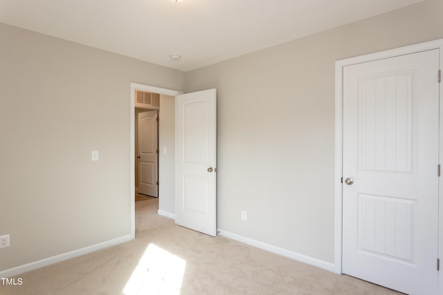 6700 Hardwick Ln, Sims, NC 27880 - unfurnished bedroom with light colored carpet and baseboards