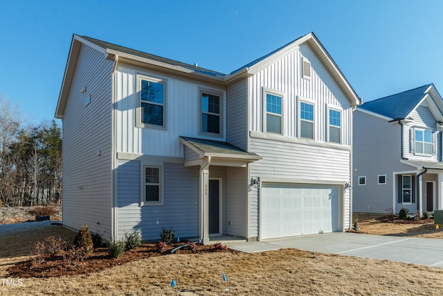 6700 Hardwick Ln, Sims, NC 27880 - traditional-style home featuring a garage, driveway, and board and batten siding