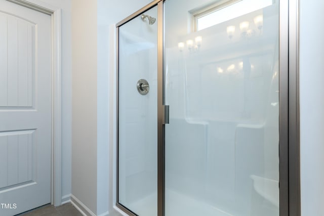 6700 Hardwick Ln, Sims, NC 27880 - full bath featuring a stall shower, baseboards, and tile patterned floors