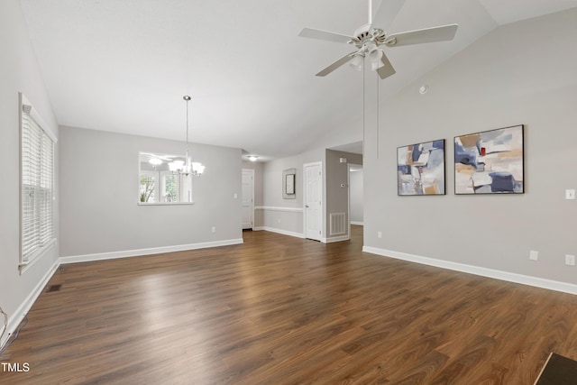 115 Heatherwood Dr, Apex, NC 27502 - unfurnished living room featuring a chandelier, a ceiling fan, lofted ceiling, dark wood finished floors, and baseboards