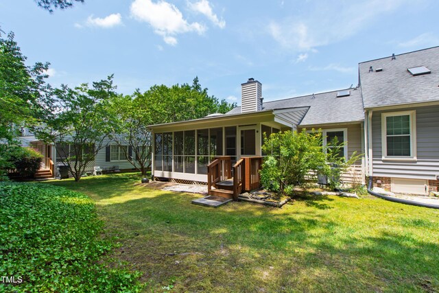 115 Heatherwood Dr, Apex, NC 27502 - view of green lawn with a sunroom