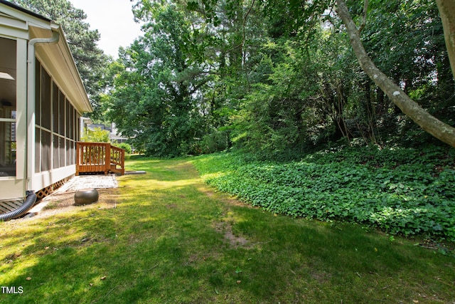 115 Heatherwood Dr, Apex, NC 27502 - view of green lawn with a sunroom