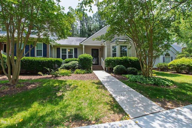 115 Heatherwood Dr, Apex, NC 27502 - view of front of house featuring a front lawn