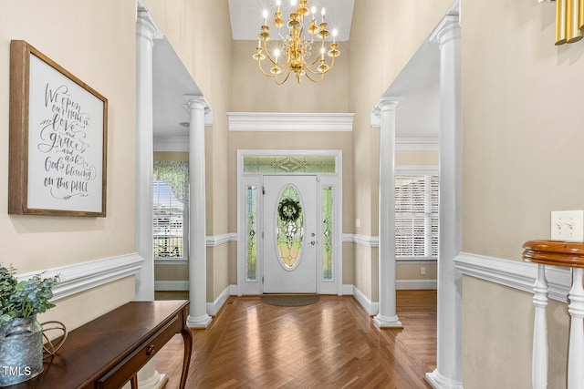 206 W Stoneybrook Ct, Benson, NC 27504 - entrance foyer with plenty of natural light, wood finished floors, baseboards, a chandelier, and a towering ceiling