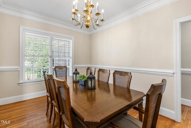 206 W Stoneybrook Ct, Benson, NC 27504 - dining space featuring a chandelier, light wood finished floors, baseboards, and crown molding
