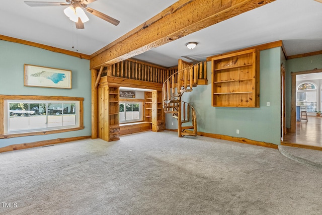 206 W Stoneybrook Ct, Benson, NC 27504 - unfurnished living room featuring ceiling fan, carpet flooring, stairs, baseboards, and crown molding