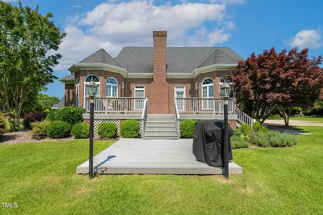 206 W Stoneybrook Ct, Benson, NC 27504 - view of front of property featuring a deck, brick siding, a front lawn, and a chimney