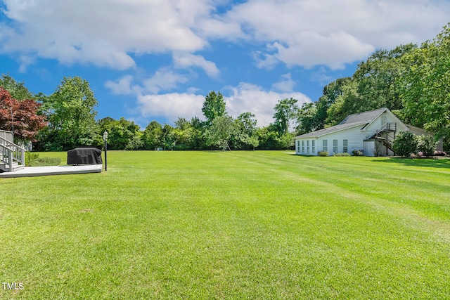 206 W Stoneybrook Ct, Benson, NC 27504 - view of grassy yard featuring view of wooded area