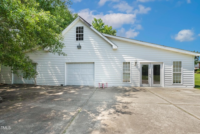 206 W Stoneybrook Ct, Benson, NC 27504 - view of side of property featuring concrete driveway and french doors
