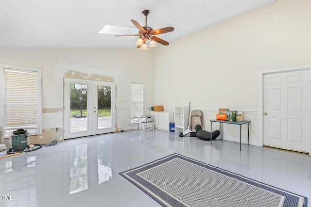 206 W Stoneybrook Ct, Benson, NC 27504 - living area featuring ceiling fan, french doors, tile patterned floors, high vaulted ceiling, and a skylight