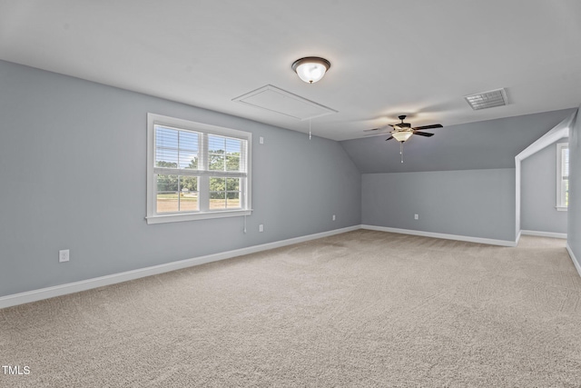 4333 US-117 Hwy, Wilson, NC 27893 - additional living space with attic access, baseboards, light carpet, a ceiling fan, and lofted ceiling