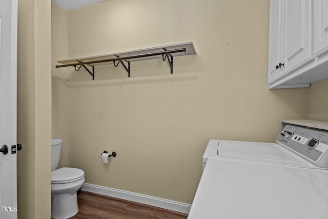 4333 US-117 Hwy, Wilson, NC 27893 - laundry area featuring washer and clothes dryer, dark wood-style flooring, and baseboards