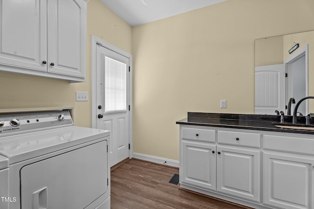 4333 US-117 Hwy, Wilson, NC 27893 - laundry room with independent washer and dryer, cabinet space, dark wood-style flooring, and baseboards