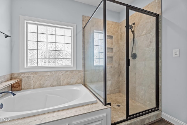 4333 US-117 Hwy, Wilson, NC 27893 - full bath with a bath, a stall shower, and plenty of natural light