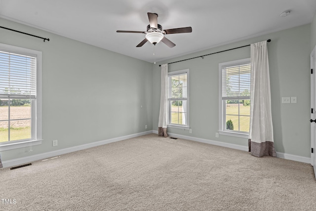 4333 US-117 Hwy, Wilson, NC 27893 - empty room featuring a smoke detector, ceiling fan, carpet flooring, and baseboards