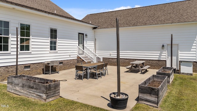 4333 US-117 Hwy, Wilson, NC 27893 - view of patio with a vegetable garden and outdoor dining space