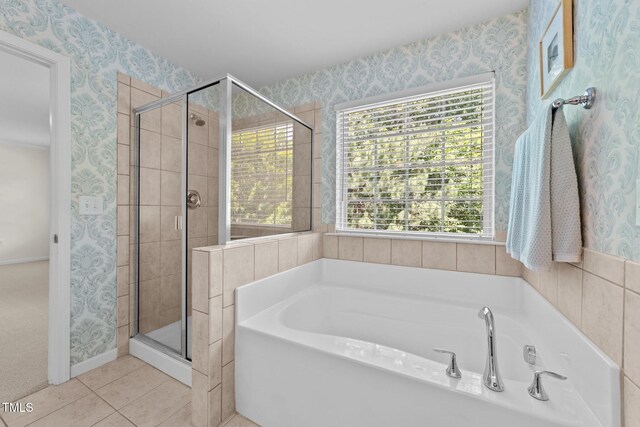 5545 Moneta Ln, Apex, NC 27539 - bathroom with a bath, a shower stall, wallpapered walls, and tile patterned floors