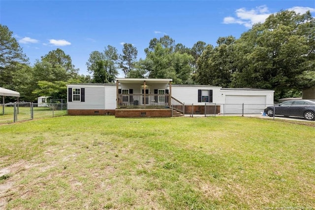 566 Quail Run Rd, Lumberton, NC 28358 - manufactured / mobile home featuring a porch, crawl space, view of scattered trees, and an attached garage