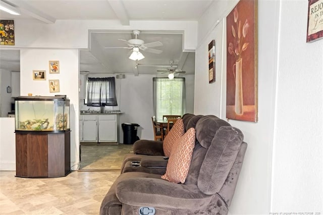 566 Quail Run Rd, Lumberton, NC 28358 - living area featuring beamed ceiling and a ceiling fan