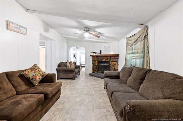 566 Quail Run Rd, Lumberton, NC 28358 - living area featuring ceiling fan, a fireplace, and arched walkways