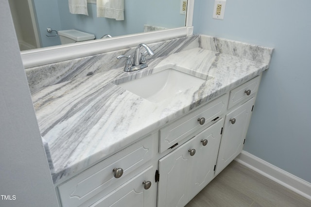 409 Glaive Dr, Durham, NC 27703 - bathroom featuring vanity and baseboards