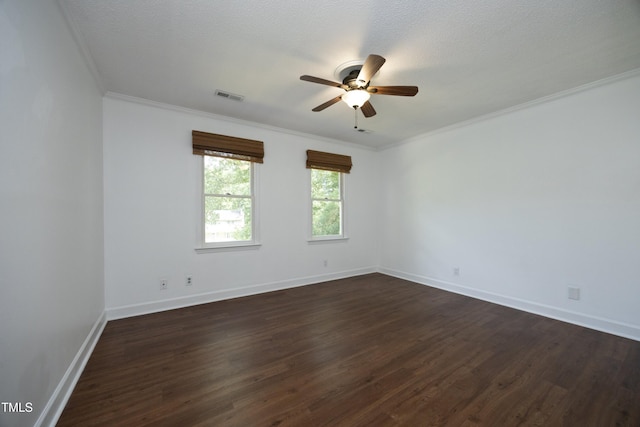 409 Glaive Dr, Durham, NC 27703 - spare room with ceiling fan, dark wood-style floors, and crown molding