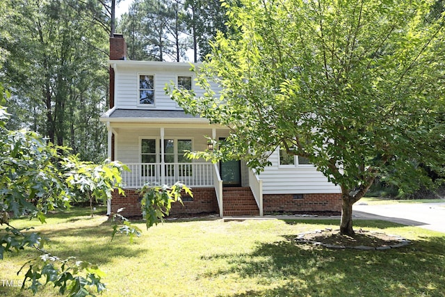 409 Glaive Dr, Durham, NC 27703 - american foursquare style home with a porch, a chimney, and a front lawn
